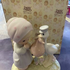 Precious Moments “joy on Arrival “ figurine.